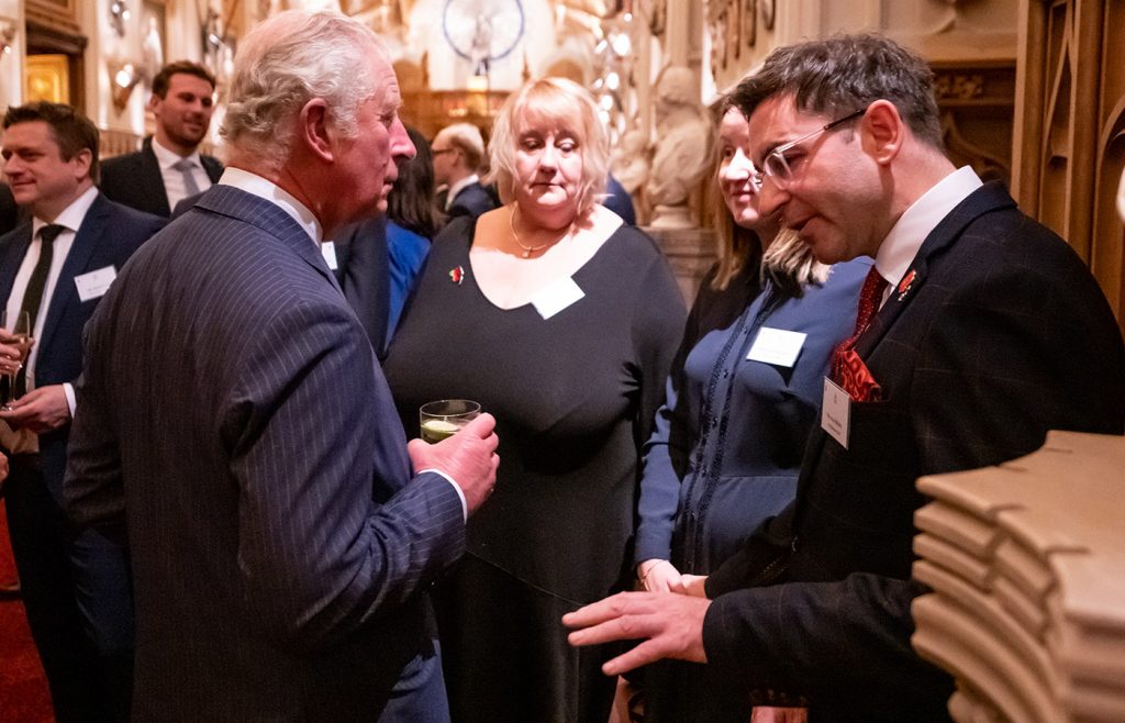 Alan Burns Executive Director at City Building speaking with HRH Prince Charles at Windsor Castle following the presentation of the ‘Promoting Opportunity Award’ to City Building