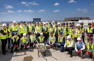 The partners came together to celebrate construction reaching its highest point on the tallest of three BTR residential buildings at the development.