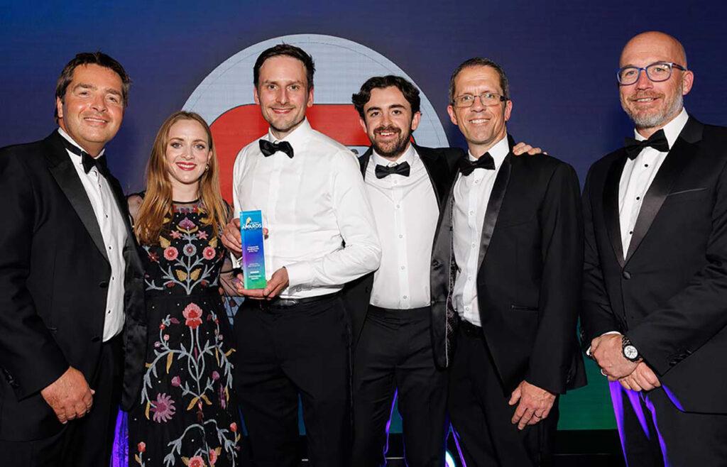 Dafydd Walters and Ed Rocke (centre) of Bouygues UK with representatives of Swansea Council and the Wales Property Awards receiving the Commercial Development of the Year Award.